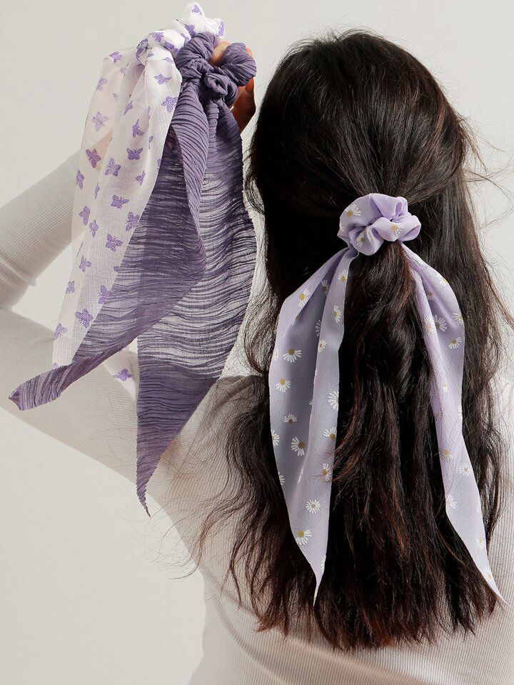 coppia di elastici per capelli con fiocchi