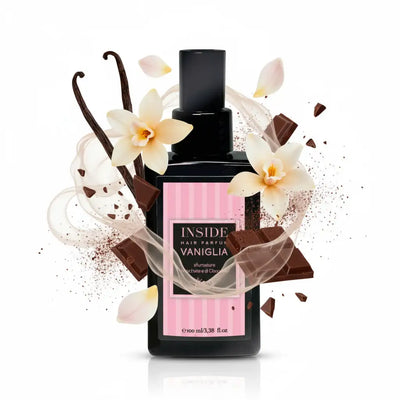 Flacone spray nero con etichetta rosa a strisce e tappo nero, con fragranza ’inside hair perfume vaniglia’.