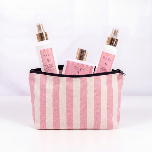 Beauty bag Ykena Soleil con shampoo spray solare latte nutriente e pochette rosa estate